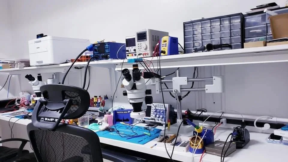 Fix Revolution repair station with microscopes and micro soldering equipment in Ottawa